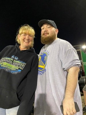 Brandon and woman, PG Racing Team 74 crew members